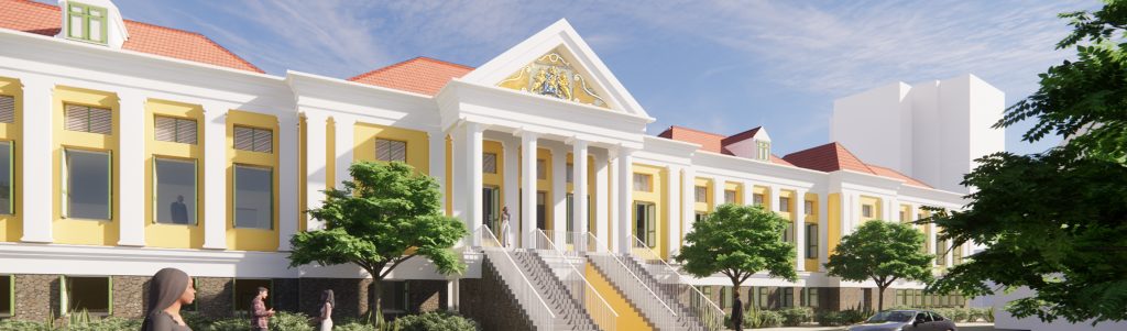 Geel en wit gebouw met bomen er om heen